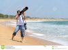 photographer-taking-photos-beach-young-48195490.jpg